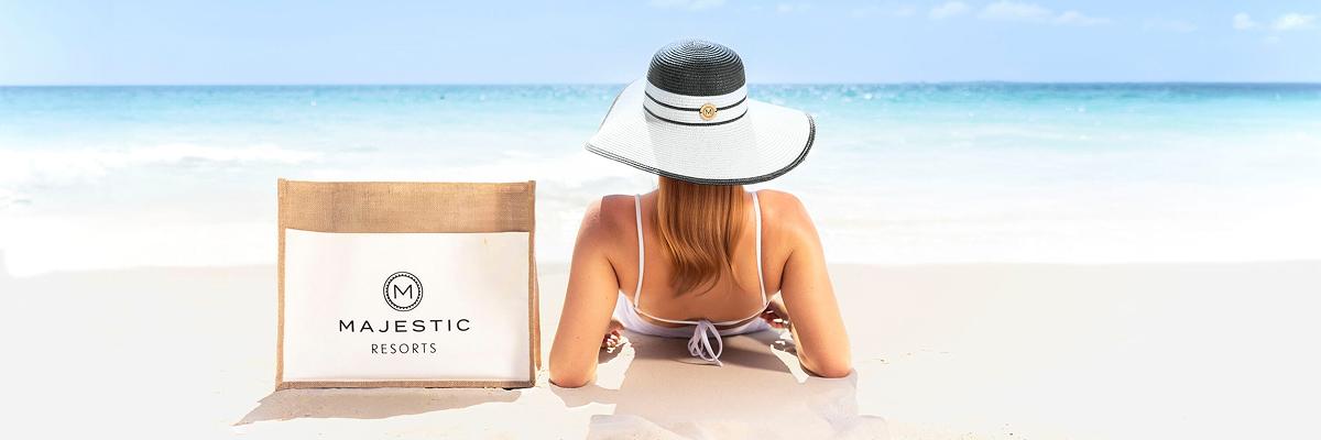 Save up to 70% all month long on an all-inclusive vacation to Majestic Resorts. - background banner